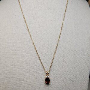 Oval Garnet Pendant Necklace with CZ Accent on 18 Inch Gold Tone Chain
